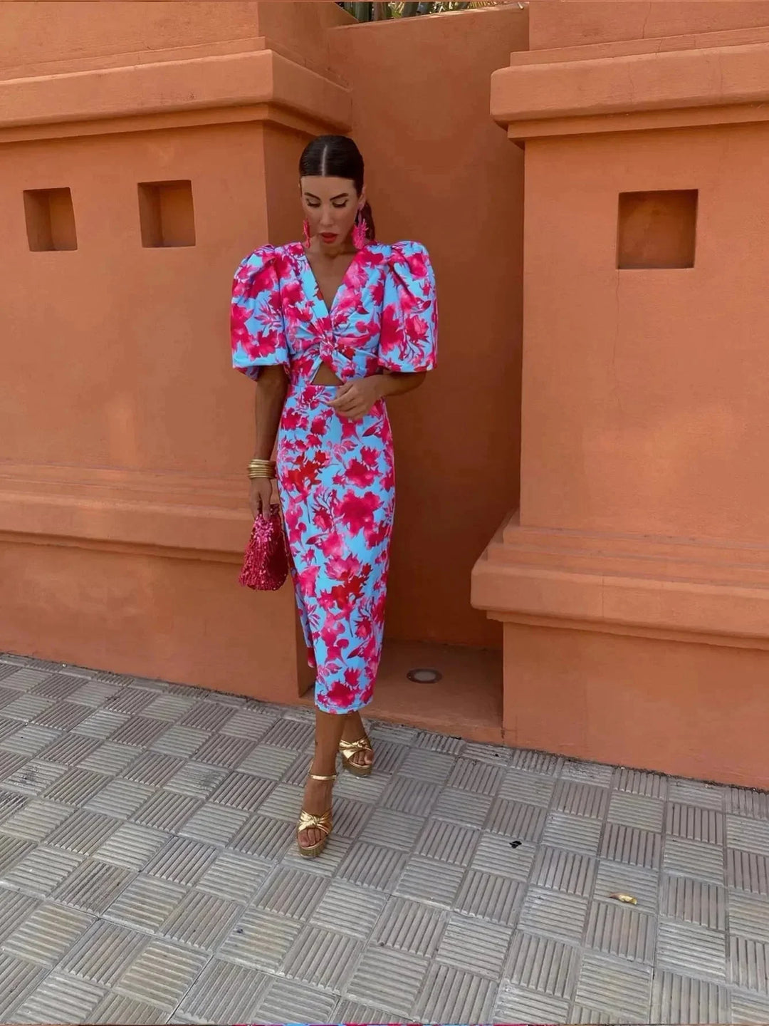 "Pink v-neck wrap midi dress with puff sleeves for women, featuring a flattering silhouette and elegant design"