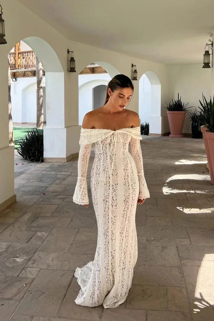 Ivory lace off-shoulder maxi dress in White, featuring bell sleeves and elegant design for a stylish look.