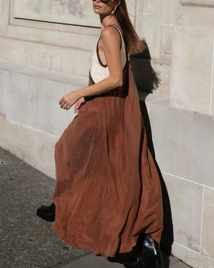 "Women's v-neck maxi dress with panel design, made of soft cotton blend, perfect for casual or dressy occasions."
