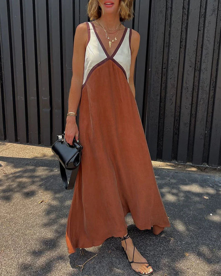 "Arabelle women's v-neck maxi dress in a panel design, made of lightweight fabric, perfect for casual or dressy occasions."