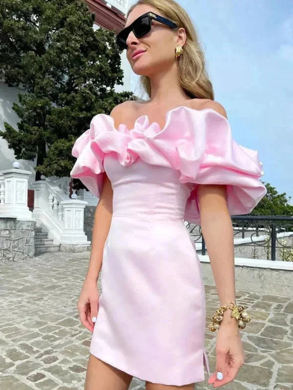 Off-shoulder mini dress with ruffles, form-fitting design. Made of soft, comfortable blend fabric. Ideal for a classy and…