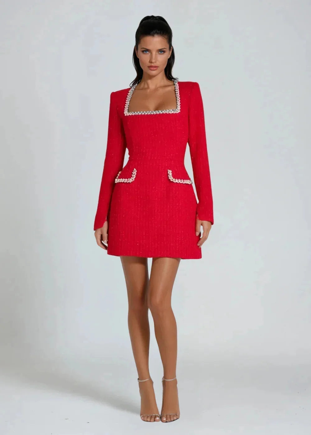 "Red mini dress featuring square neckline, intricate beading, and elegant design."