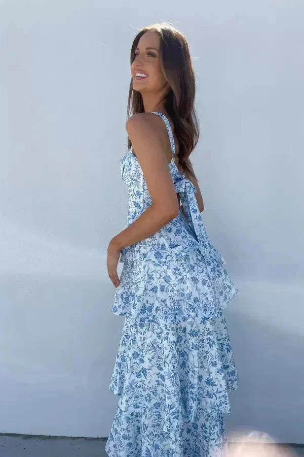 "Women's sleeveless floral maxi dress with bow back in a lightweight fabric, perfect for a summer day out."
