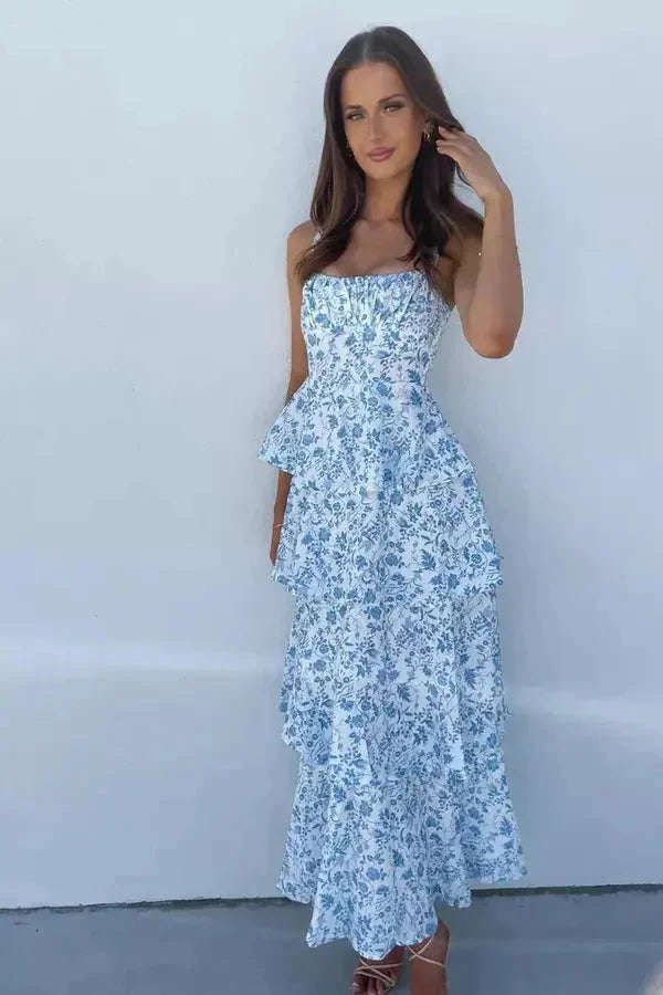 "Women's floral maxi dress featuring a stylish bow back design, made from lightweight and breathable material."