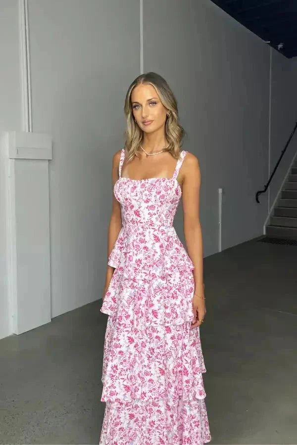 Pink floral maxi dress with a charming bow back design for women. Made from soft and breathable fabric. Perfect for casual…