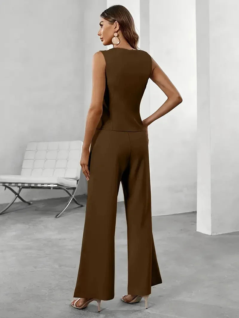 "Women's tailored vest set in navy blue with wide-leg pants, ideal for professional attire or formal occasions."