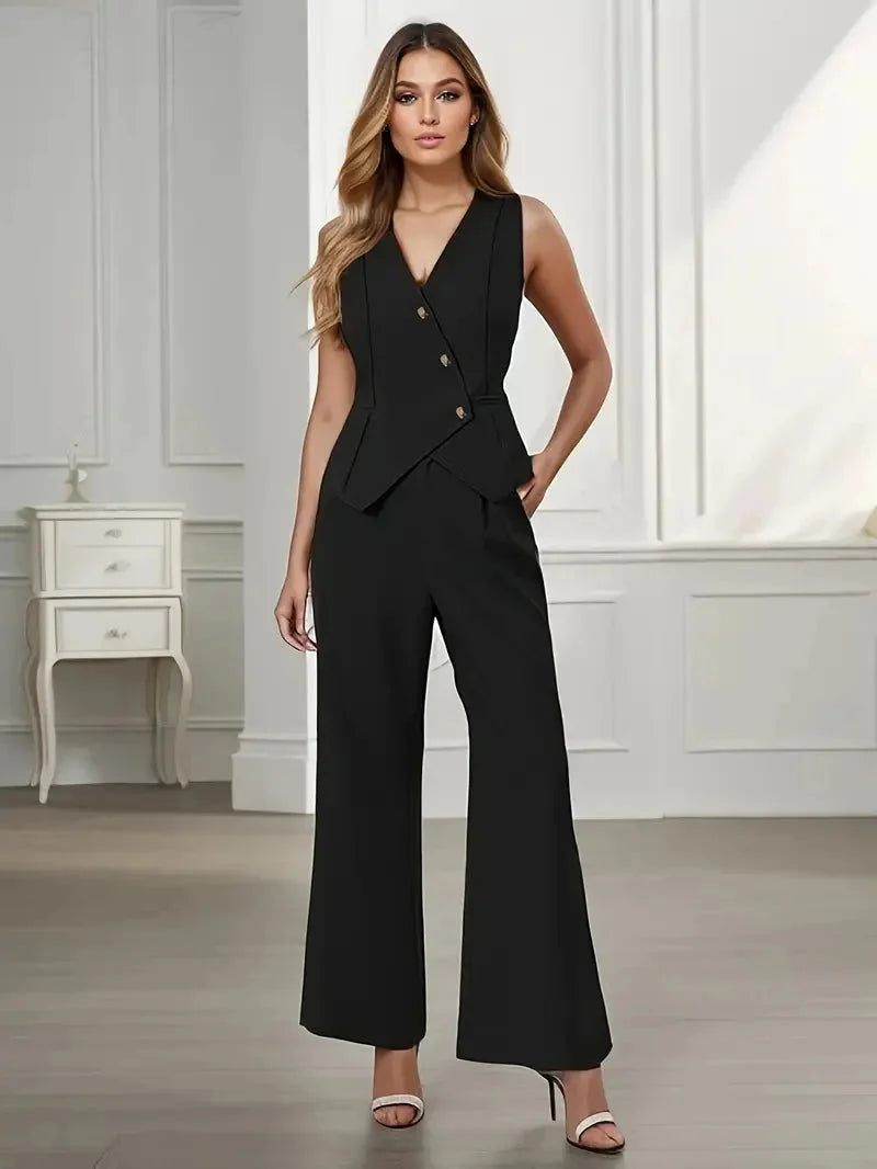 "Black tailored vest with white pinstripes and matching wide-leg pants for women, perfect for a sophisticated and stylish…