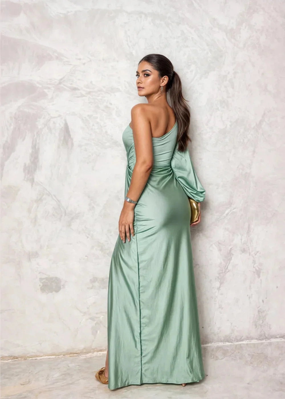 Black satin one-shoulder dress with a side slit, showcasing a sleek and elegant design perfect for special occasions.