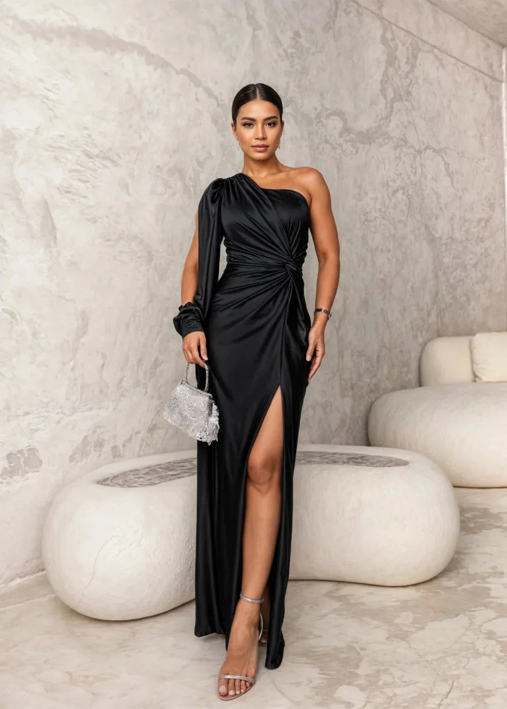 Black satin one-shoulder dress with side slit, elegant and chic design for special occasions.