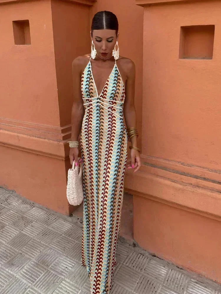 "Women’s multicolor chevron maxi dress in Rainbow, featuring a striking chevron design in vibrant hues, perfect for a bold…