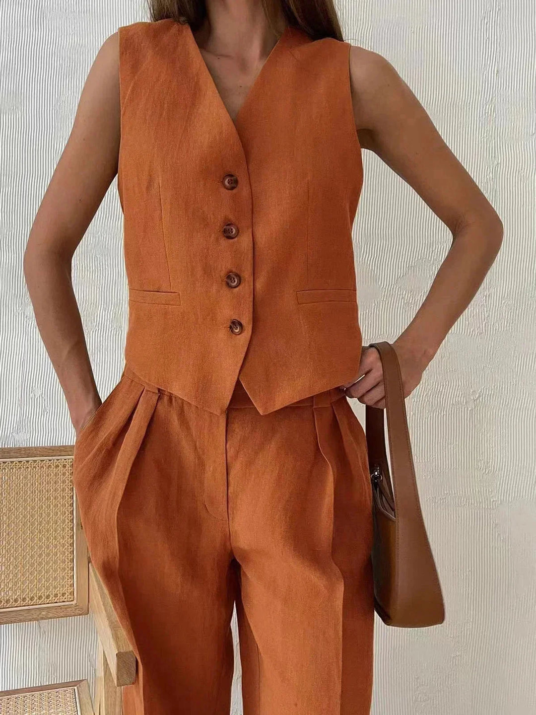 "Casual women's vest and pants set in earthy tones with a modern design and comfortable fit"