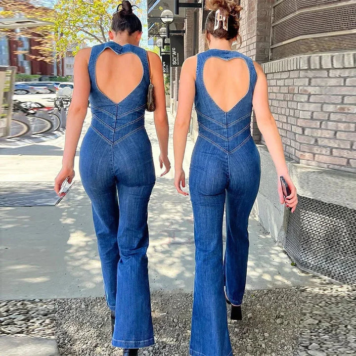 Blue sleeveless jumpsuit with fitted bodice and flared legs. Soft denim material with chic design perfect for casual…