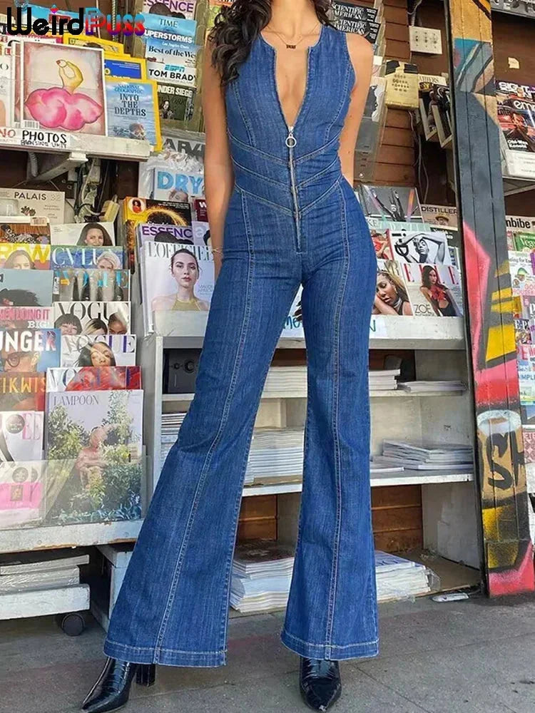 Sleeveless blue jumpsuit featuring a fitted bodice and flared legs. Made of breathable fabric and perfect for the upcoming…