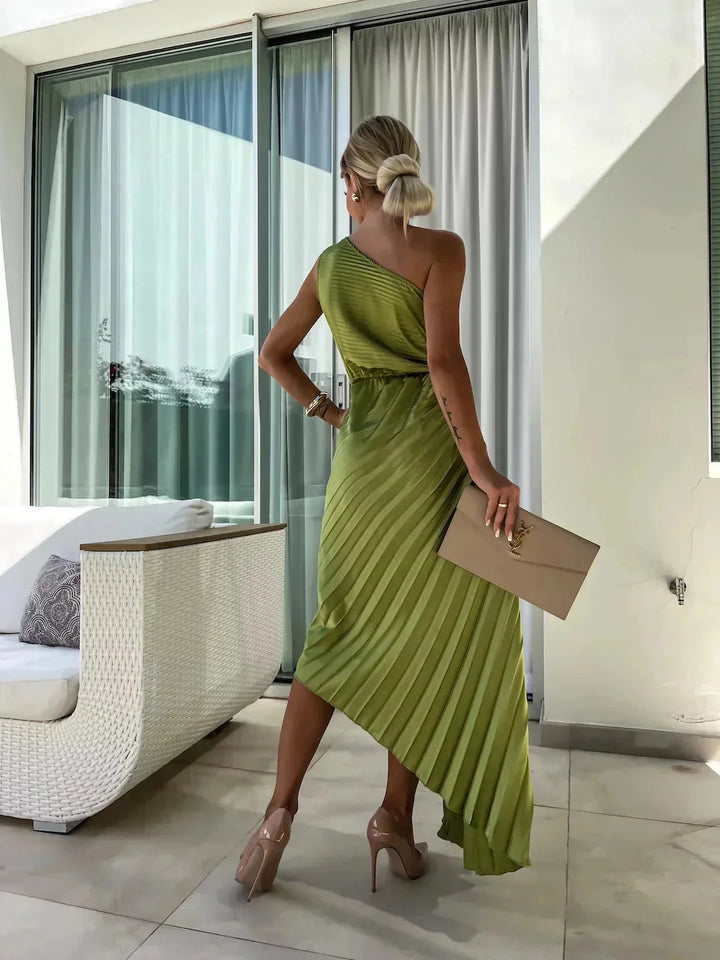 "Stormii women's one-shoulder dress with pleated detailing, perfect for formal events or evening outings, made of…