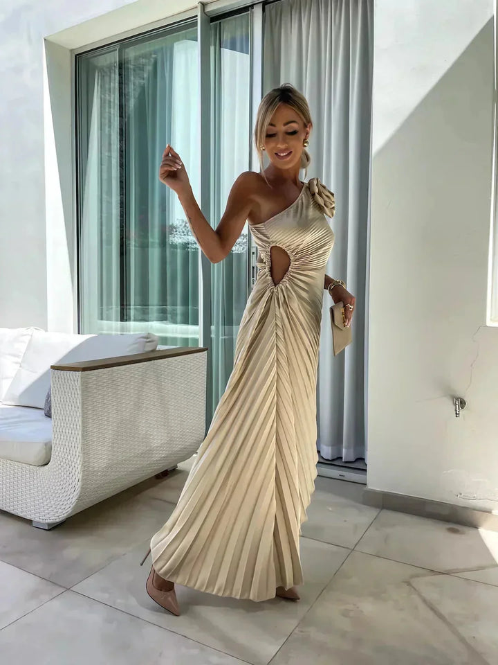 One-shoulder pleated dress for women, featuring a stylish design with a textured fabric perfect for special occasions.