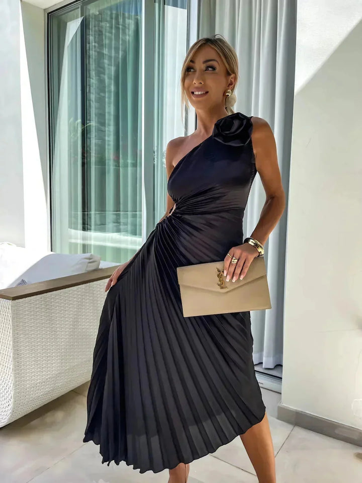 "Black pleated one-shoulder dress for women featuring a modern design with a unique asymmetrical neckline."