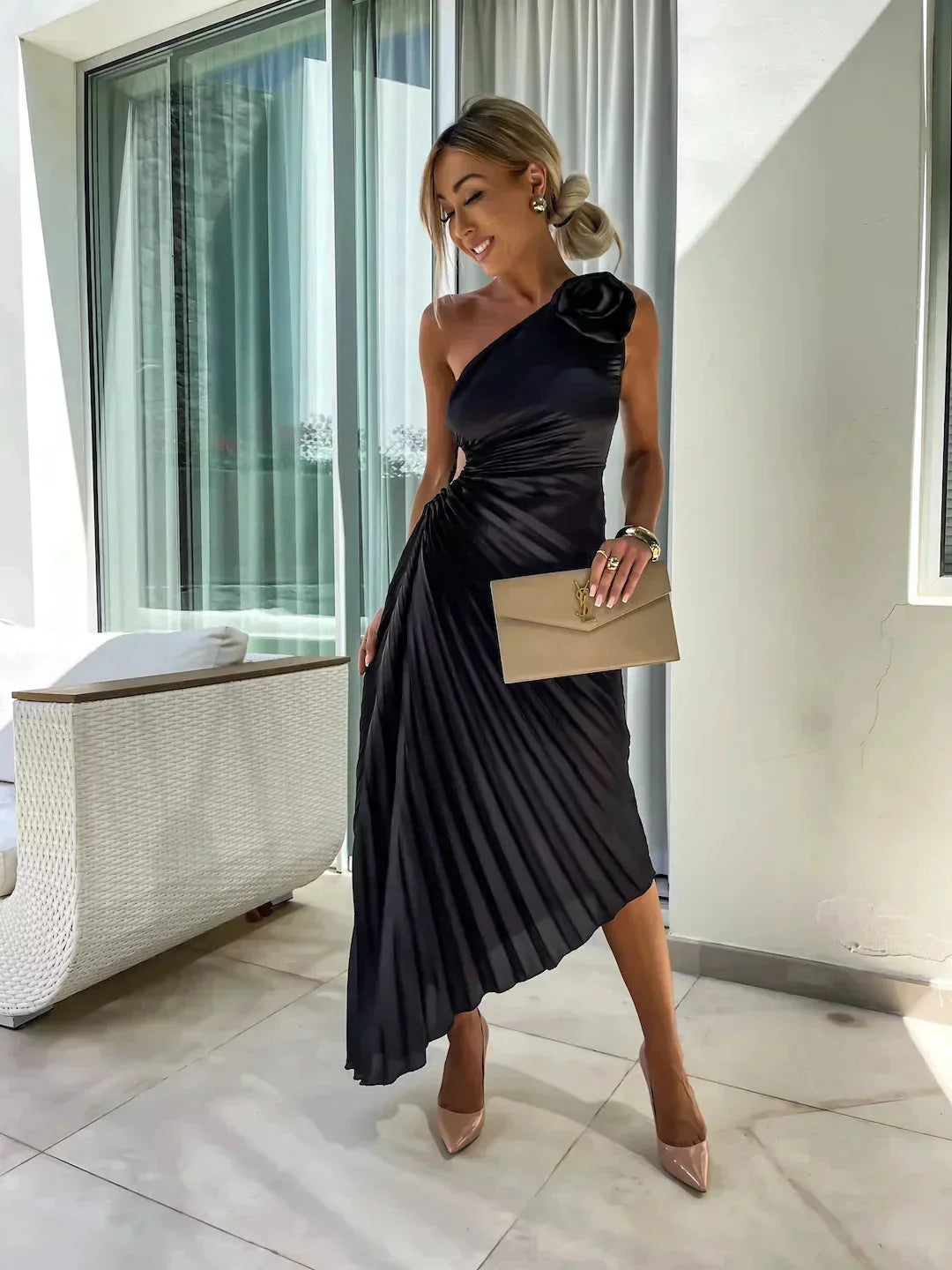 "Black one-shoulder dress featuring pleated design for women, perfect for elegant occasions. Made from high-quality fabric…