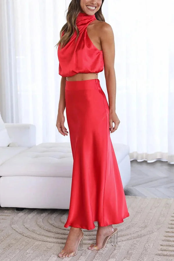 "Zoha two-piece set: Women’s satin halter top and skirt set in elegant red color with v-neck and high waist design."