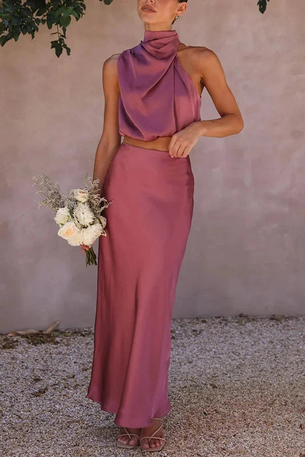 "Black satin halter top and skirt set for women with elegant design and sleek finish"