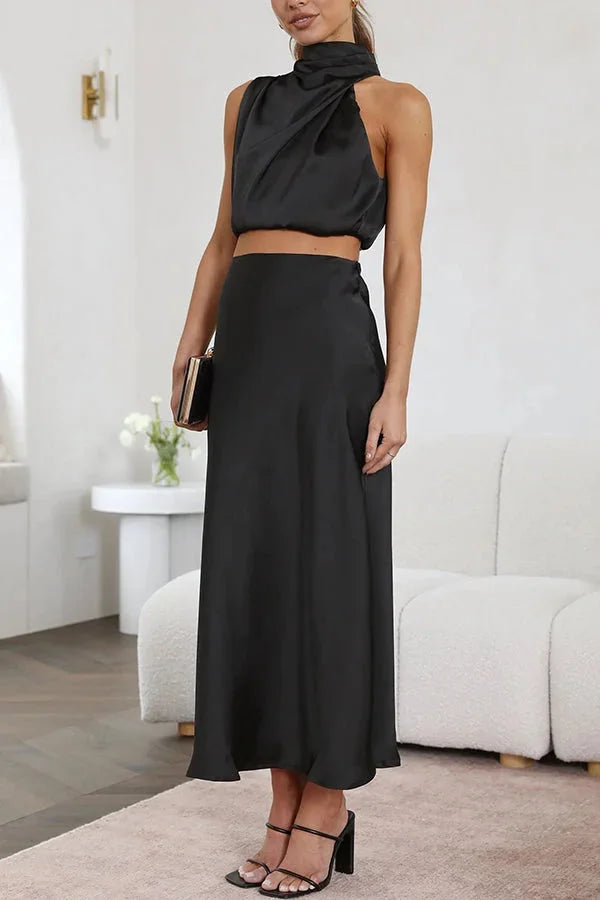 Black satin halter top and skirt set for women by Zoha - sleek, elegant design with a smooth, shiny finish perfect for a…
