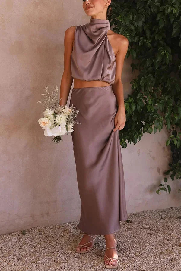 "Satin halter top and skirt set in Mocha. Sleek, elegant design with a luxurious sheen perfect for any special occasion."